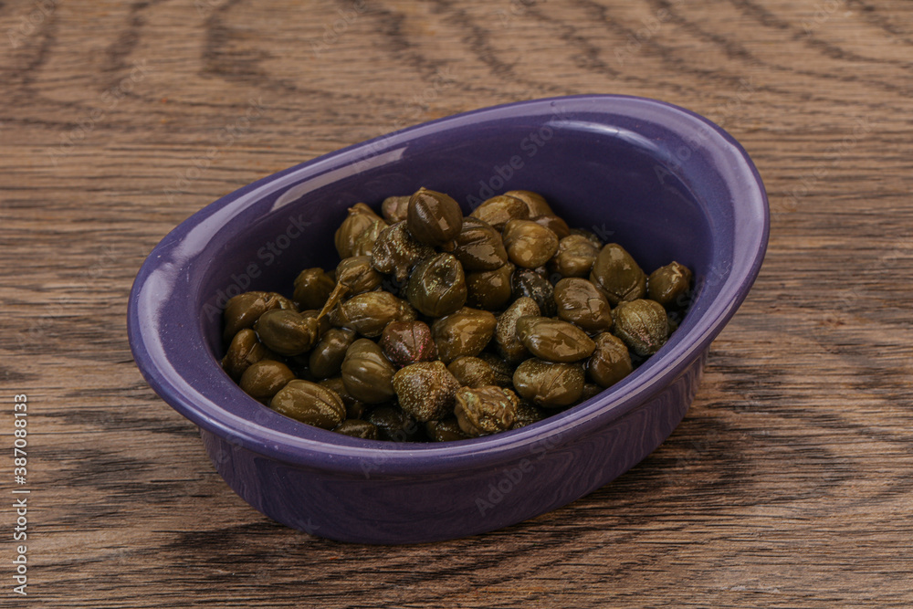 Tasty capers in the bowl Tasty capers in the bowl