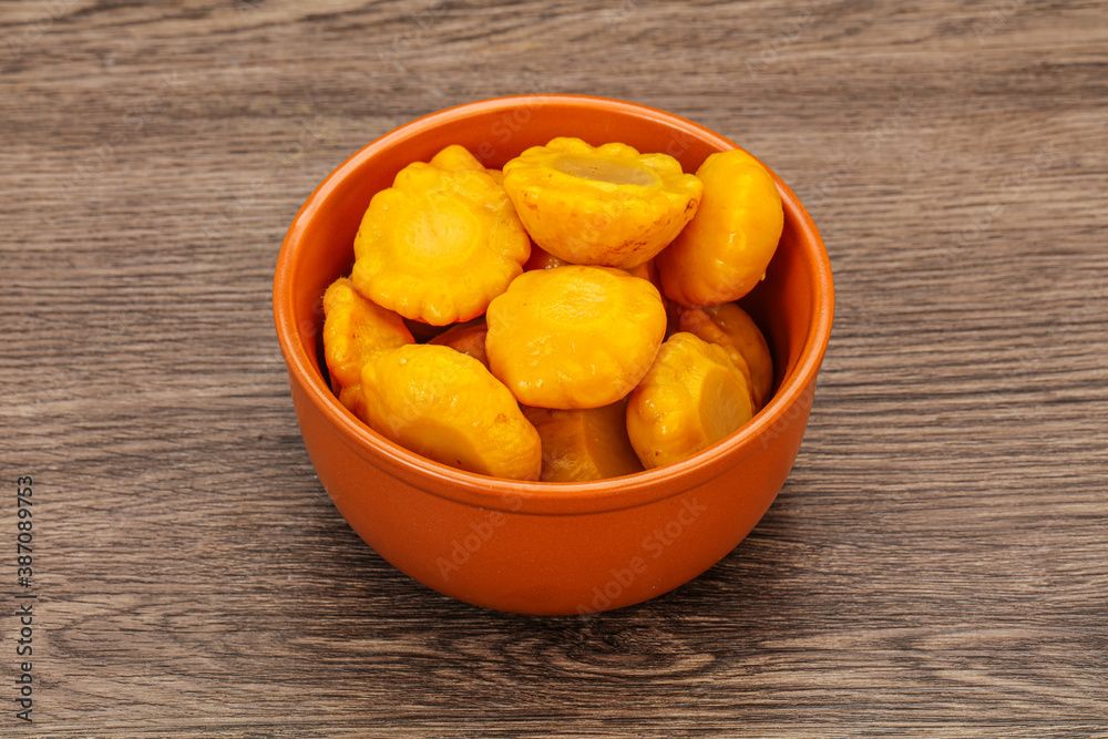 Marinated yellow patisson in the bowl Marinated yellow patisson in the bowl