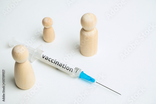 Family vaccination concept with syringe and abstract family