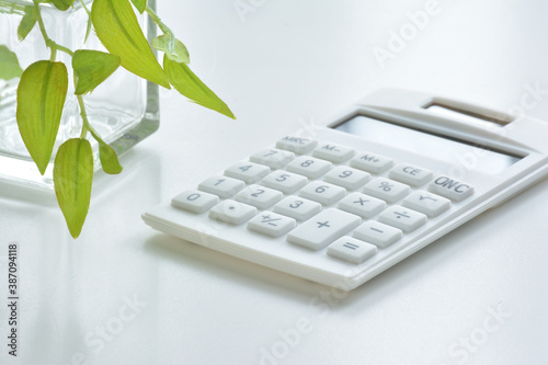 Calculator on a white desk