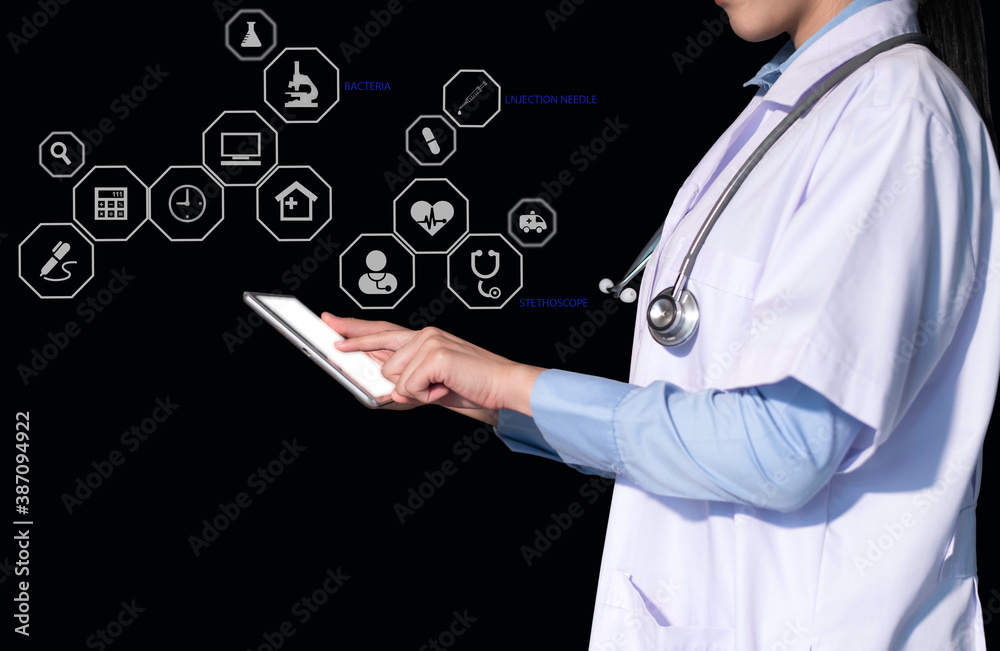 Healthcare And Medicine. Doctor using a digital tablet. Healthcare And Medicine. Doctor using a digital tablet.