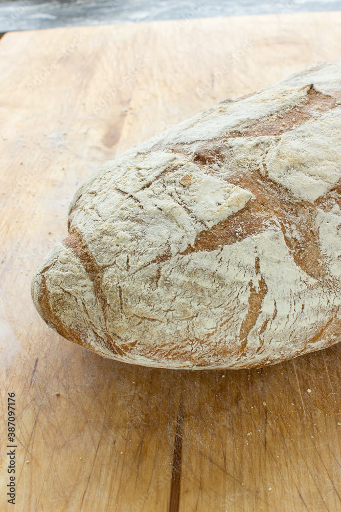 Closeup on bread on wooden surface Closeup on bread on wooden surface