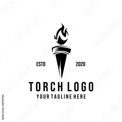 vintage torch with fire logo vector illustration design