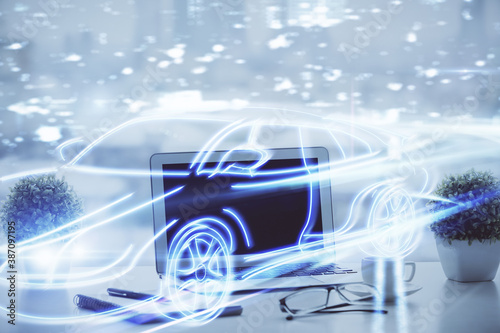 Desktop computer background in office with automobile hologram drawing. Multi exposure. Tech concept. © peshkova