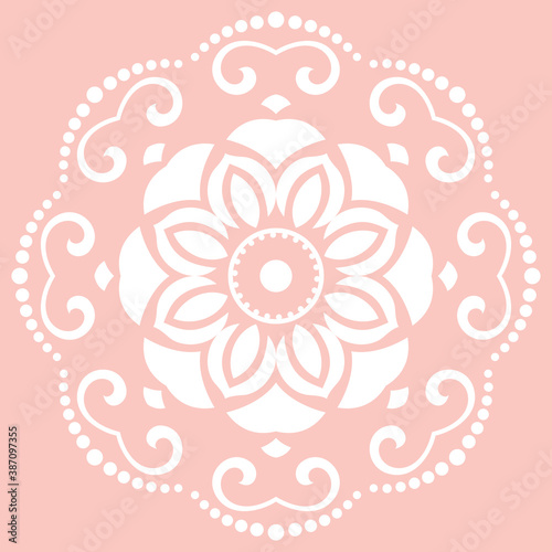 Oriental vector round pink and white pattern with arabesques and floral elements. Traditional classic ornament. Vintage pattern with arabesques