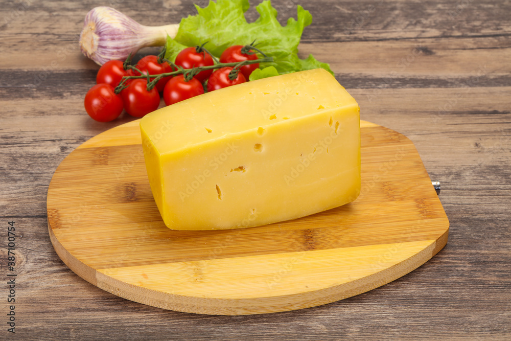 Hard yellow tasty cheese brick Hard yellow tasty cheese brick