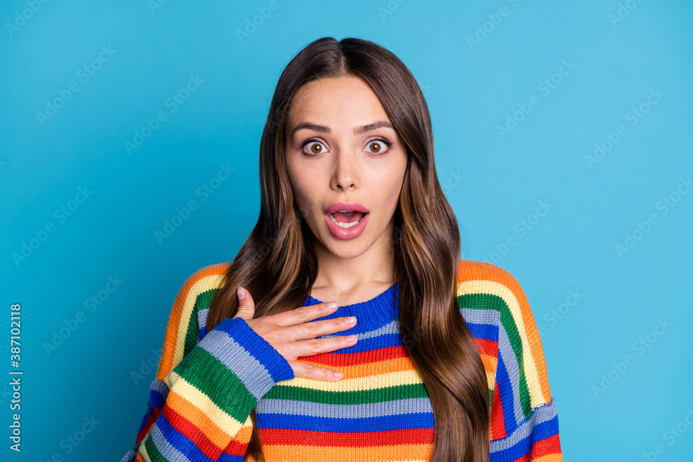 Close-up portrait of her she nice attractive lovely wondered impressed brown-haired girl wearing casual sweater good news reaction isolated bright vivid shine vibrant blue color background Close-up portrait of her she nice attractive lovely wondered impressed brown-haired girl wearing casual sweater good news reaction isolated bright vivid shine vibrant blue color background