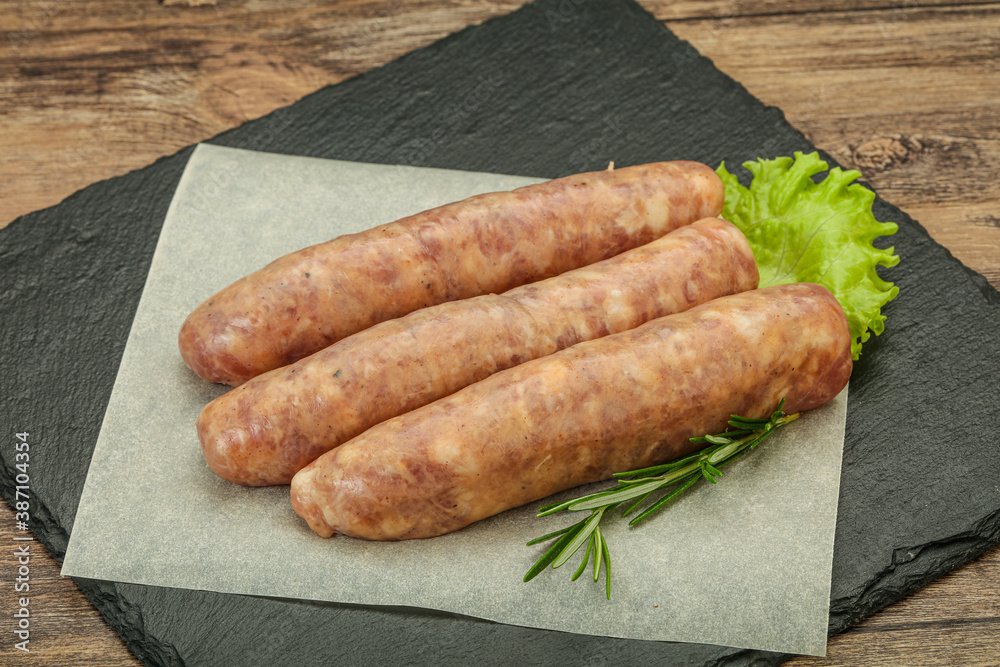 Raw pork meat sausages for grill Raw pork meat sausages for grill