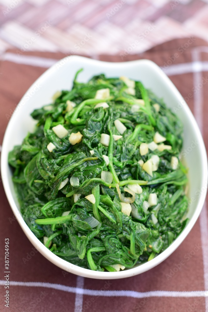 Sauteed garlic spinach. Healthy diet vegetarian Sauteed garlic spinach. Healthy diet vegetarian