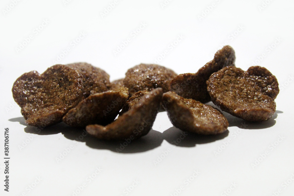 Close up of tasty and crunchy choco crunch on white background