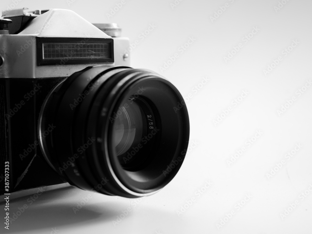 Details of an old film camera on a white background
