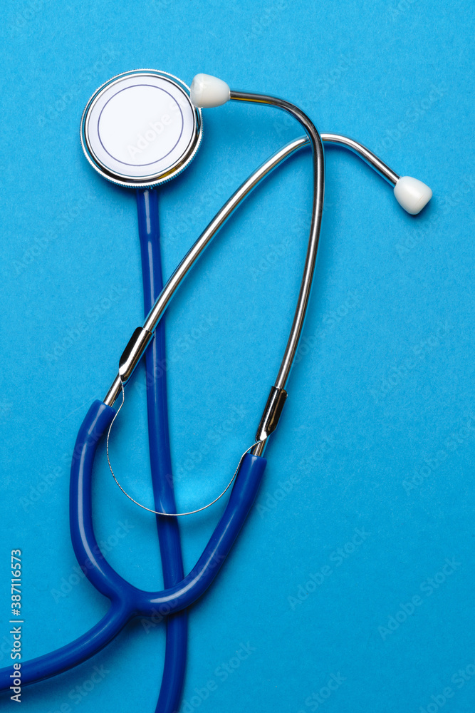 Top view of Medical stethoscope on blue background Top view of Medical stethoscope on blue background