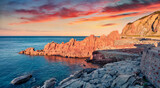 Fabulous morning view of Red Rocks Beach, Arbatax. Stunning summer seascape of Mediterranean sea. Fantastic sunrise on Sardinia island, Italy Europe. Beauty of nature concept background.