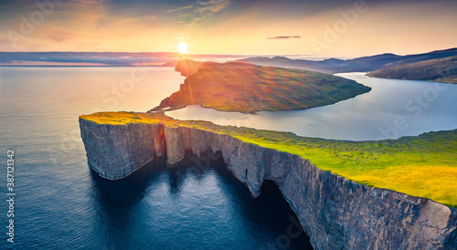 Gorgeous morning view from flying drone of Sorvagsvatn lake, Vagar, Faroe Islands, Denmark, Europe. Perfect summer sunrise on Atlantic Ocean. Beauty of nature concept background.