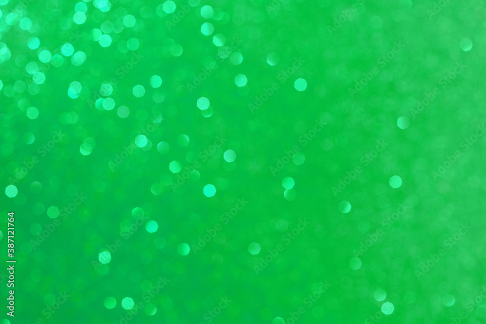 Abstract green background. Beautiful bokeh effect. Light circles background.