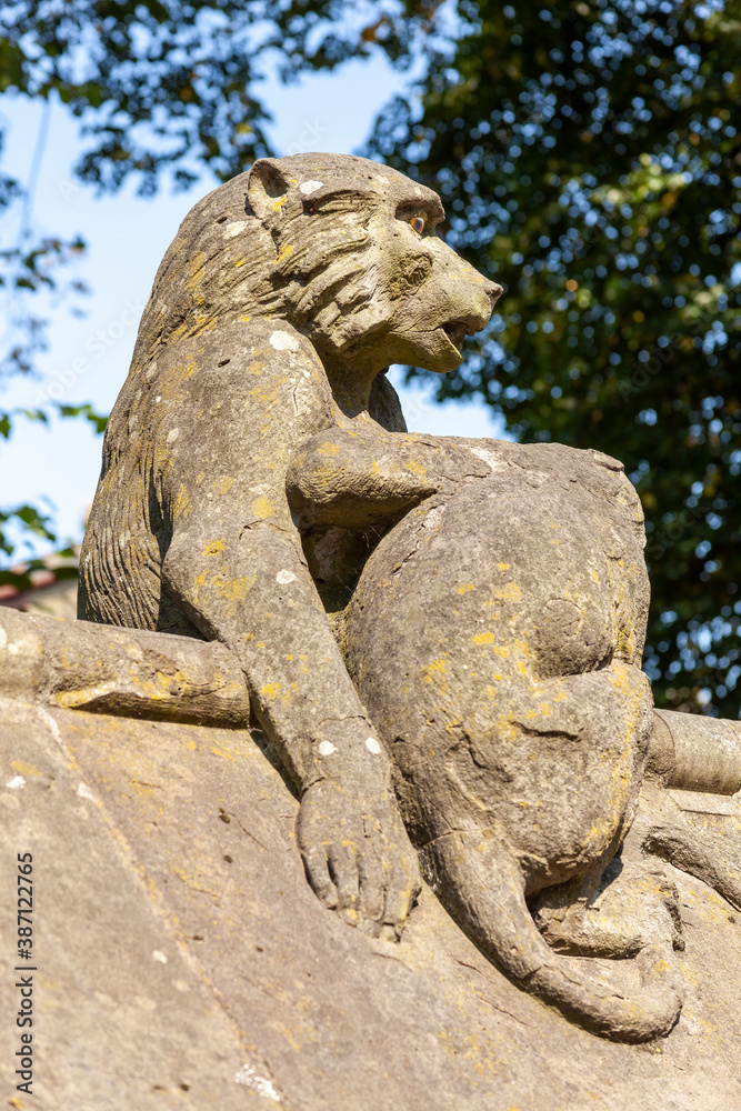 Baboon monkey sculpture from the Animal Wall of Cardiff Castle in Wales built in 1890 in Castle Street which is a popular travel destination tourist attraction landmark of the city stock photo image