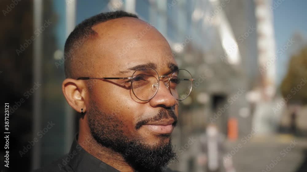 Portrait of trendy african american man. Close up of happy handsome business man in glasses. Office worker in good mood. People portraits. Portrait of trendy african american man. Close up of happy handsome business man in glasses. Office worker in good mood. People portraits.