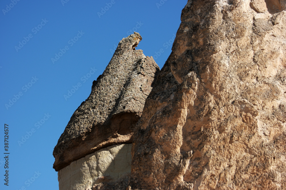 Close up of stone formations in Cappadocia, Turkey. Volcanic stone formations background.