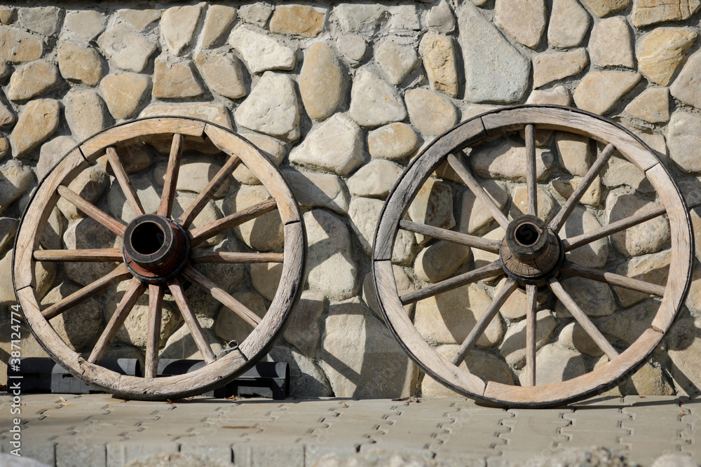 Old wooden cart wheels