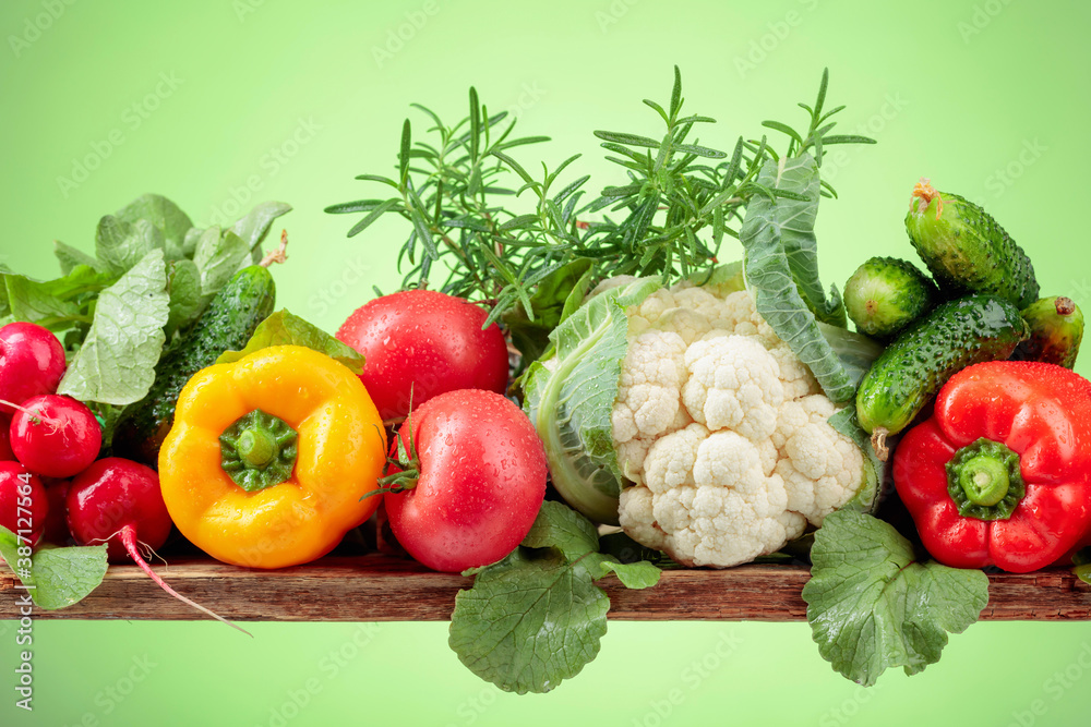 Various fresh raw vegetables, frontal view. Various fresh raw vegetables, frontal view.