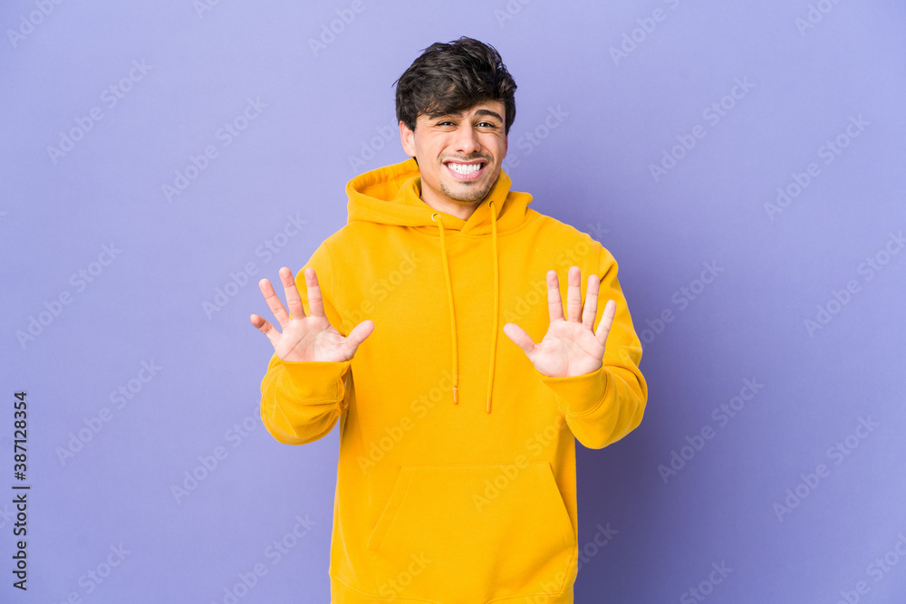 Young cool man rejecting someone showing a gesture of disgust. Young cool man rejecting someone showing a gesture of disgust.
