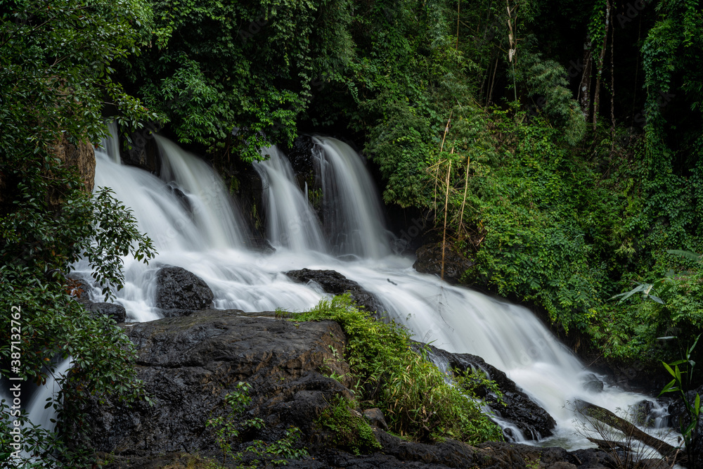 Fototapeta premium Pha suea Waterfall located in Tham Pla -Namtok Pha Suea National Park, Mae Hong Son Province, Thailand