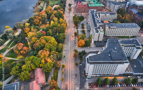 Obraz na płótnie Aerial view of the Mannerheimintie street with many yellow trees. The autumn cityscape, Helsinki, Finland. w salonie