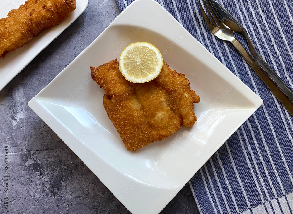 Stockfoto Breaded cod fish fillets, also known as Kabeljau. The fish is