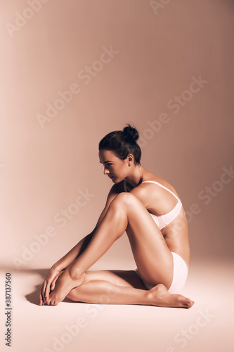 sitting sepia woman in white underwear