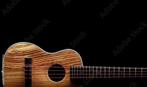 Canvas Print zebrawood ukulele with red strings close up