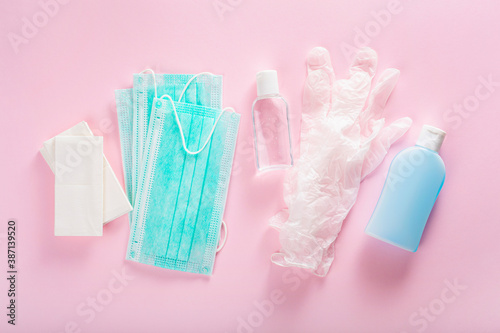 protective medical mask, sanitizer gel and gloves. protective measures against virus, bacteria