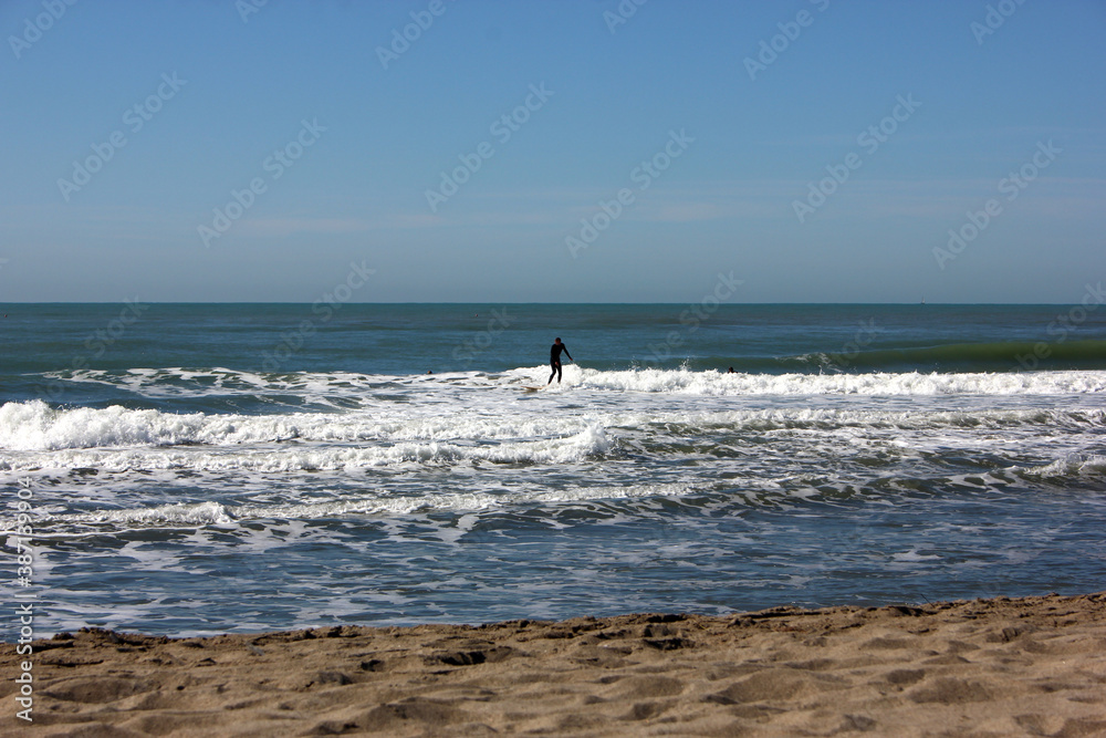 Surfing in corona times at Forte dei Marmi, Tuscany, Italy Surfing in corona times at Forte dei Marmi, Tuscany, Italy