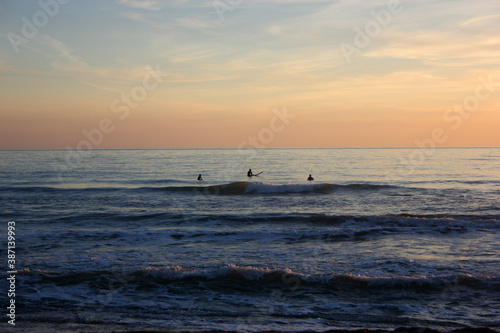 Surfing in corona times at Forte dei Marmi, Tuscany, Italy