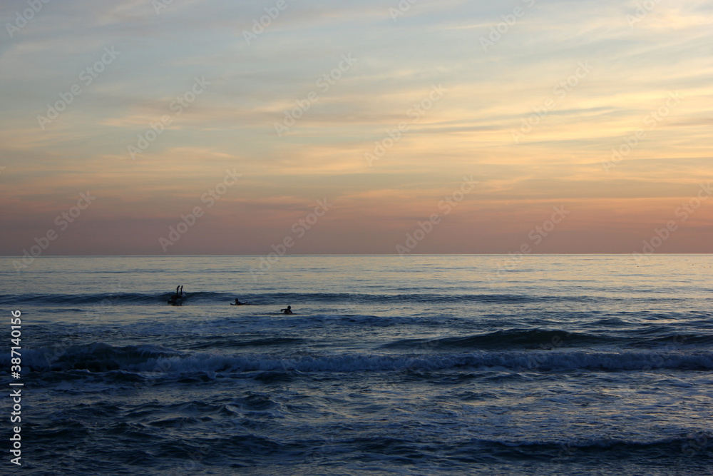 Surfing in corona times at Forte dei Marmi, Tuscany, Italy