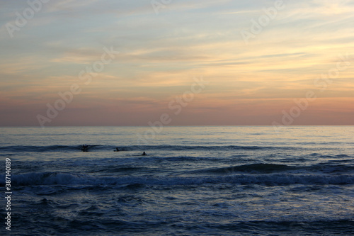 Surfing in corona times at Forte dei Marmi, Tuscany, Italy