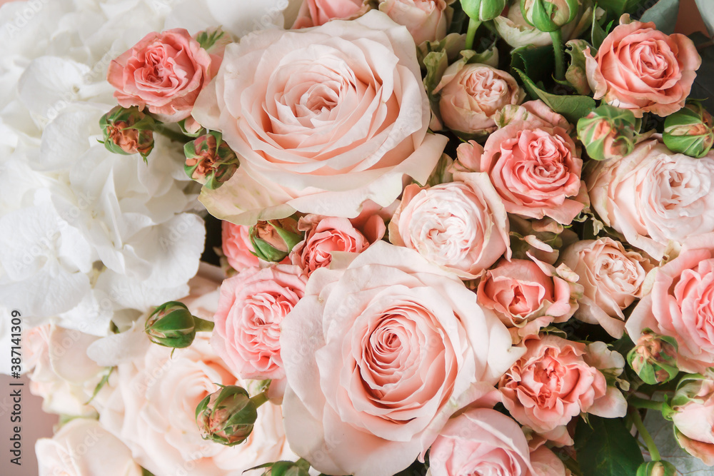 A beautiful bouquet with pale pink roses close-up. Background from flowers. Background for congratulations. Flowers for birthday. Romantic background.