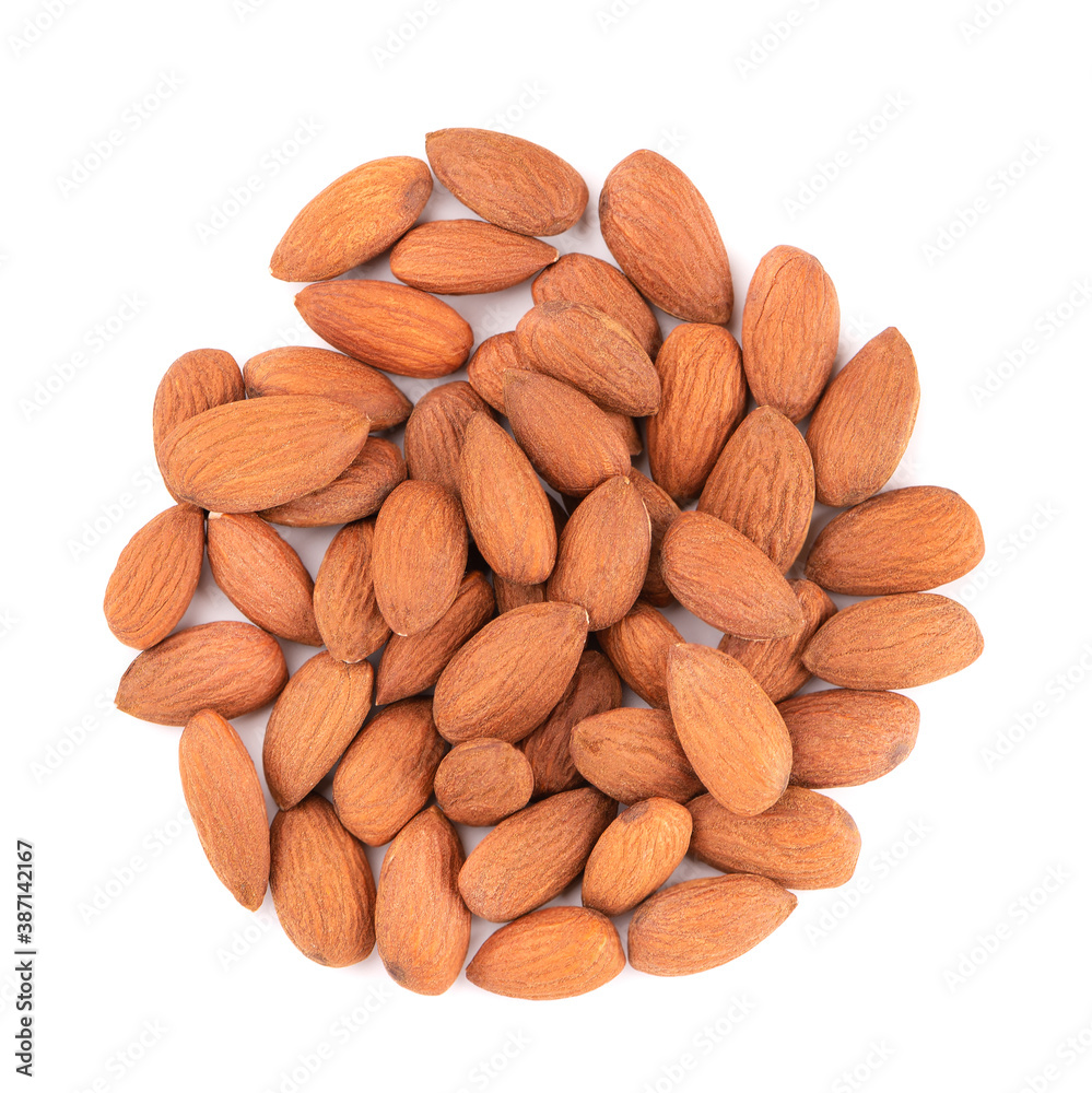 Almonds nuts isolated on white background. Pile of fried almond nuts. Top view. Almonds nuts isolated on white background. Pile of fried almond nuts. Top view.