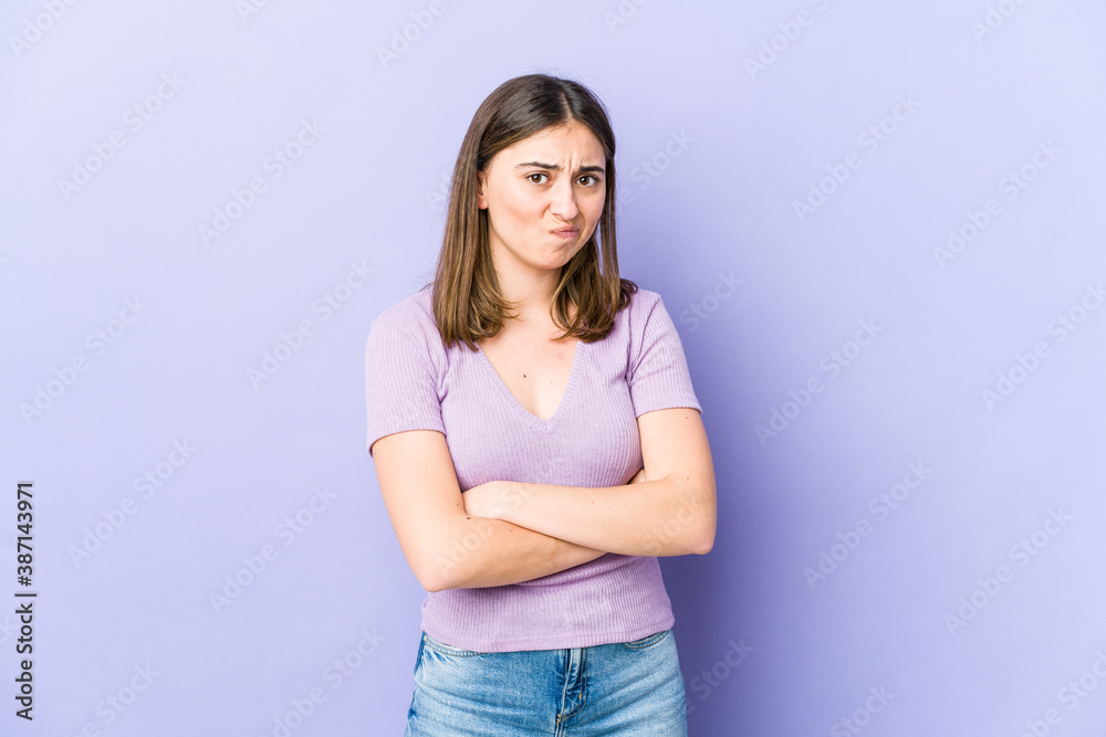 Young caucasian woman unhappy looking in camera with sarcastic expression. Young caucasian woman unhappy looking in camera with sarcastic expression.