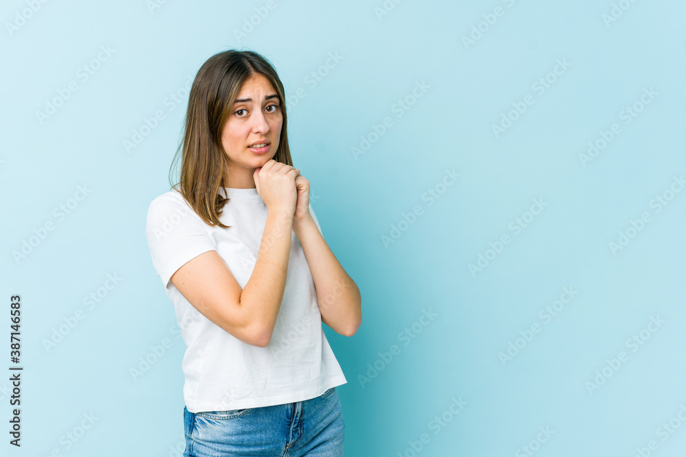 Young caucasian woman scared and afraid. Young caucasian woman scared and afraid.