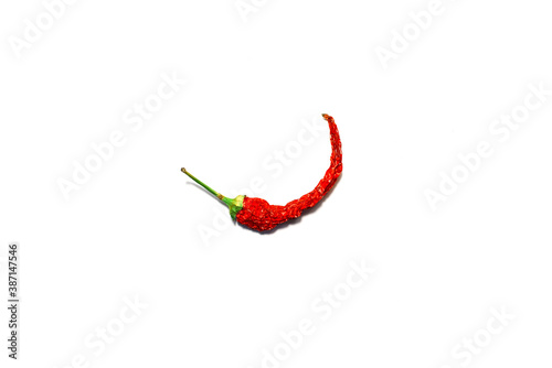 Hot  dry red pepper. Single chili. Isolated on a white background  top view.