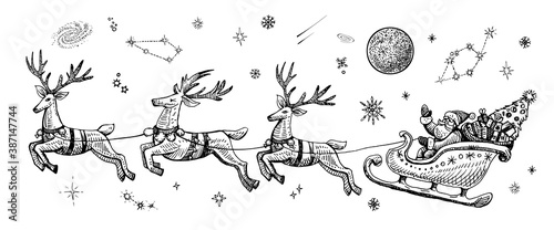 Vector Santa Claus in the night sky with stars on a sleigh with reindeers, sketch vintage illustration. photo