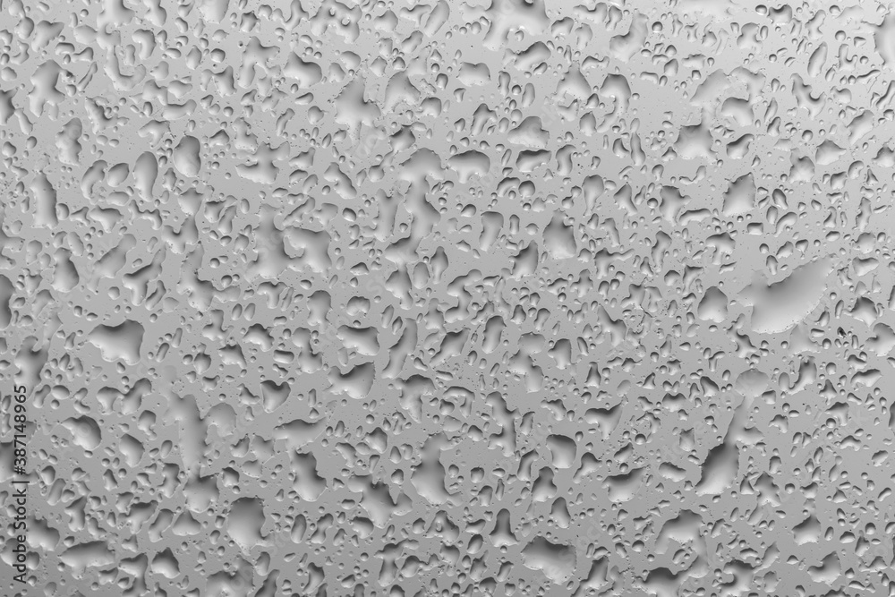 water drops on glass background texture. rain on the grey window water drops on glass background texture. rain on the grey window