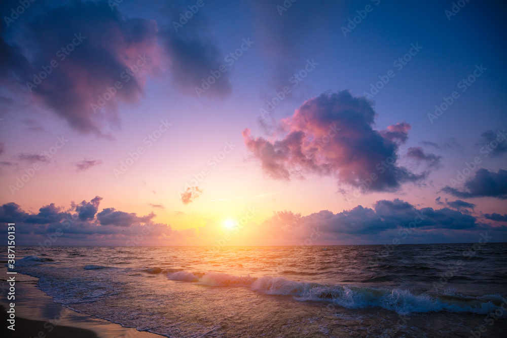 Seascape in the evening. Sunset over the sea with beautiful sky Seascape in the evening. Sunset over the sea with beautiful sky