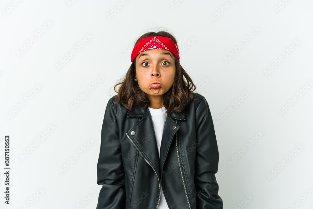 Young latin rocker woman isolated on white background Young latin rocker woman isolated on white background