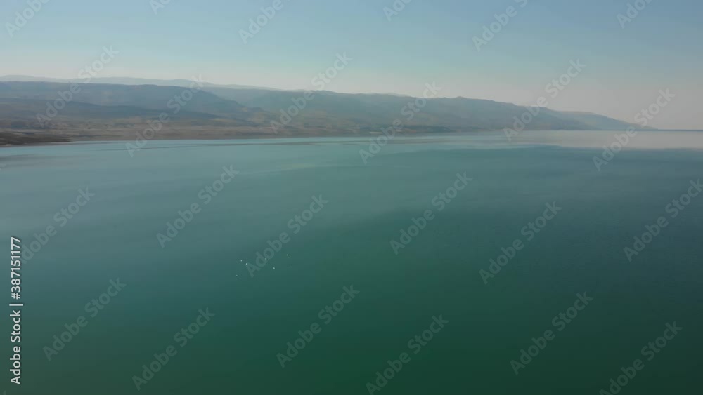 Aerial View of Dead Sea, Jordan with Mountains in the Background Aerial View of Dead Sea, Jordan with Mountains in the Background