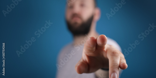 young man touch something w...