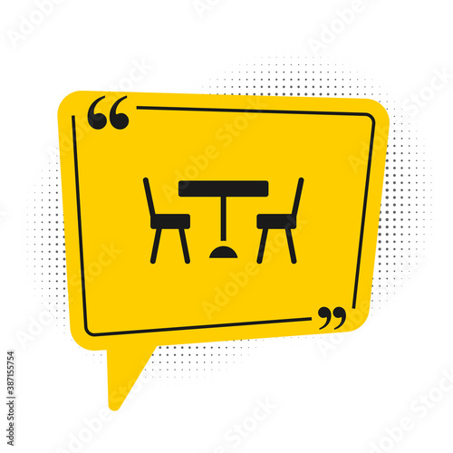 Black Picnic table with chairs on either side of the table icon isolated on white background. Yellow speech bubble symbol. Vector.
