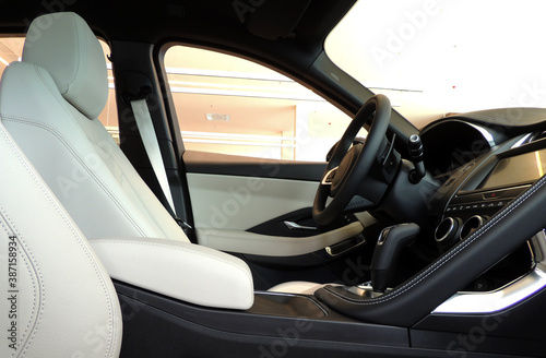 White Leather Upholstery Inside Car Side View  © AnyVIDStudio