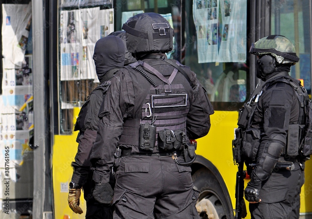 Close-up of Exercises of Russian SWAT to free hostages captured by terrorists on a bus Close-up of Exercises of Russian SWAT to free hostages captured by terrorists on a bus