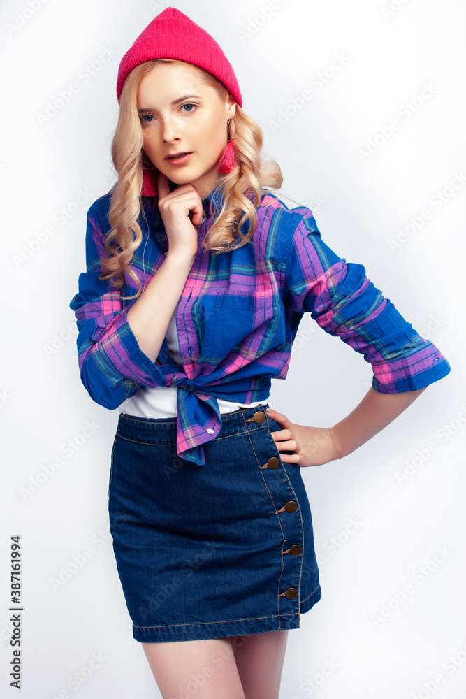 young pretty blond teenage hipster girl posing emotional happy smiling, gesturing isolated on white background, lifestyle poeple concept young pretty blond teenage hipster girl posing emotional happy smiling, gesturing isolated on white background, lifestyle poeple concept